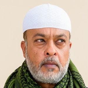 portrait of handsome bearded muslim man against pl 2021 09 04 14 27 21 utc min